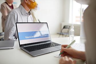  nurse registering people covid 19 vaccination center copy space